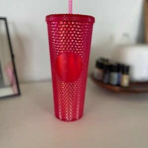 Bright red Starbucks tumbler